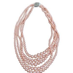 Antique over 80 years, old, pink, five strand pearls with rhinestones clip.